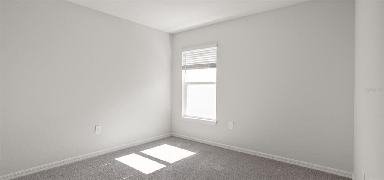 Spacious, unfurnished interior of a new home in VillaMar, Winter Haven (Image 17).