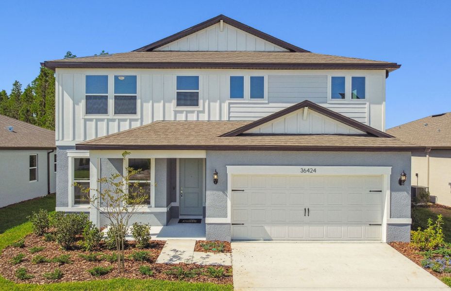 Representative exterior photo of a completed home built from the Tilden by Pulte Homes in Riverwood, Zephyrhills, FL (Image 18).