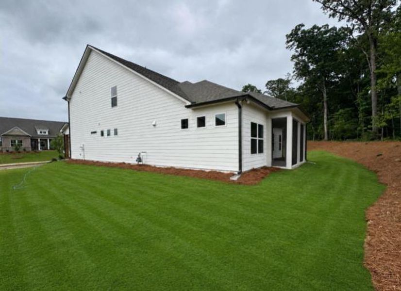 Exterior details and patio area of a home in Rosewood Lake Preserve, Hoschton (Image 25). Exterior details and patio area of a home in Rosewood Lake Preserve, Hoschton (Image 25).