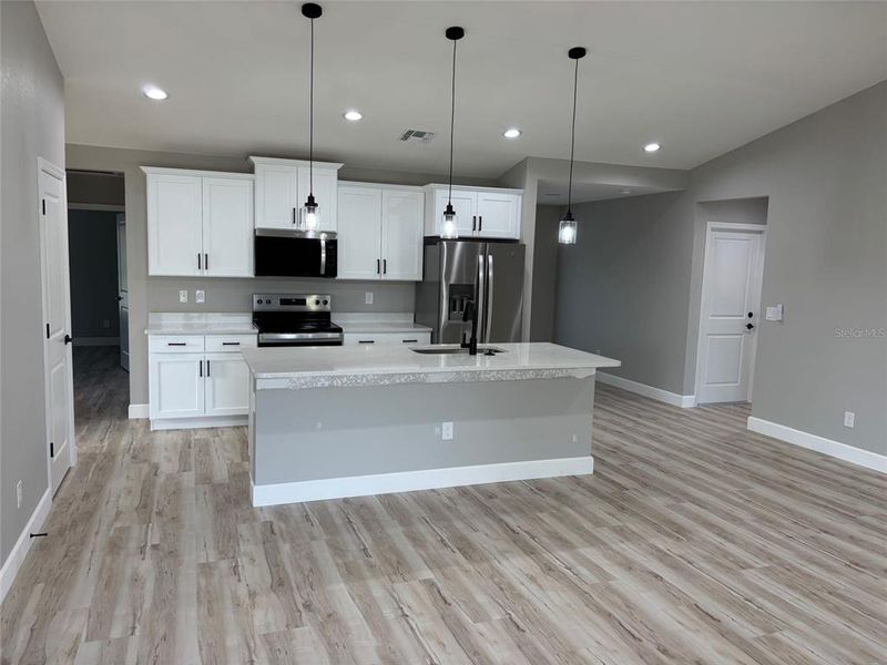 Furnished interior view inside a new home in , Cape Coral (Image 5). Furnished interior view inside a new home in , Cape Coral (Image 5).