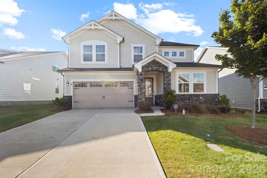 The front view of your new home. Landscaping on point! The front view of your new home. Landscaping on point!