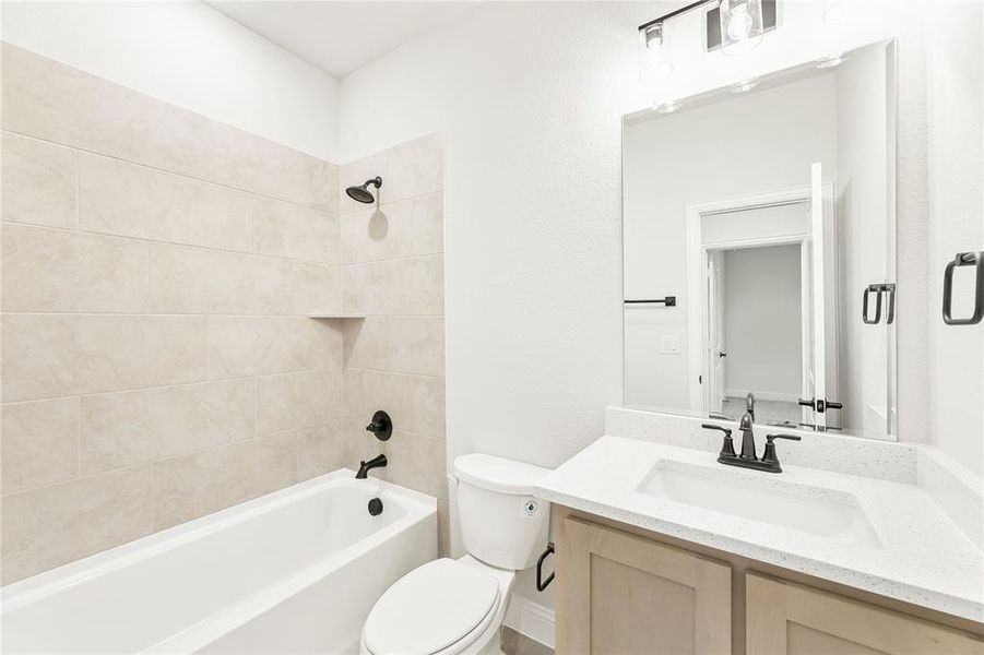 Furnished interior view inside a new home in Stone River Glen 60s, Royse City (Image 11).