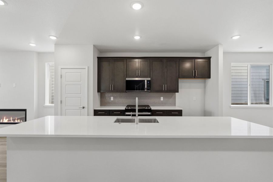 Furnished interior view inside a new home in Barefoot Village, Firestone (Image 17).