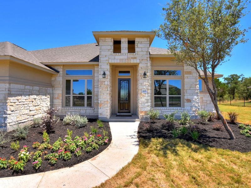 Representative exterior photo of a completed home built from the San Simeon I by Giddens Homes in Clearwater Ranch, Liberty Hill, TX (Image 37).