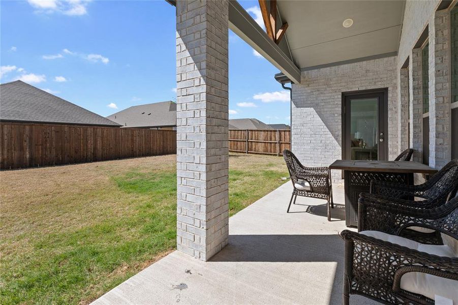 Exterior details and patio area of a home in LakePointe, Lavon (Image 26).