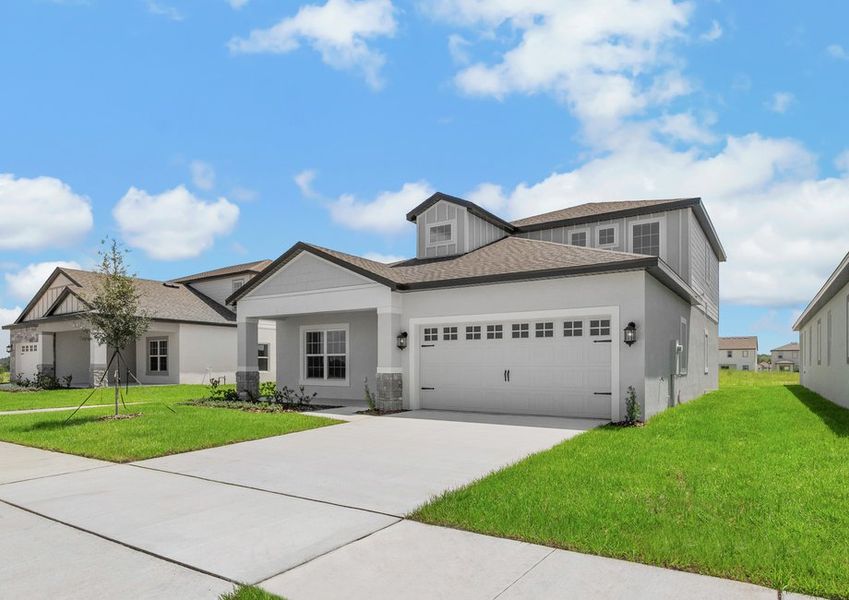 This home has a 2-car garage and gorgeous stone detailing. This home has a 2-car garage and gorgeous stone detailing.