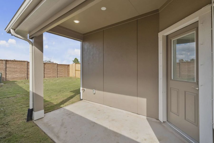 Representative exterior details of a home built from the Chalet by Chesmar Homes in Meridiana Townhomes, Iowa Colony (Image 3).
