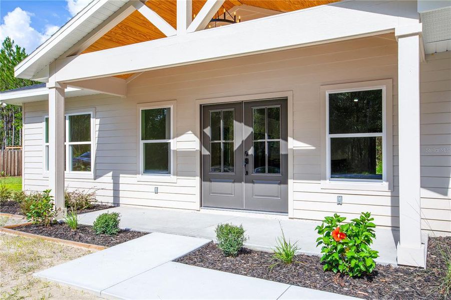 Exterior details and patio area of a home in , Raiford (Image 24).