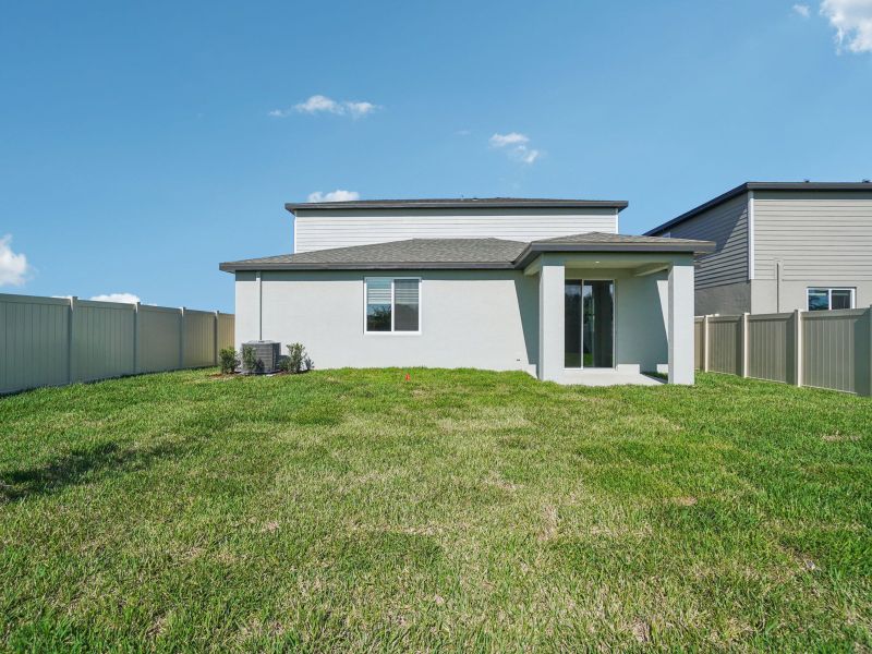 Exterior details and patio area of a home in Two Rivers - Classic Series, Zephyrhills (Image 3).