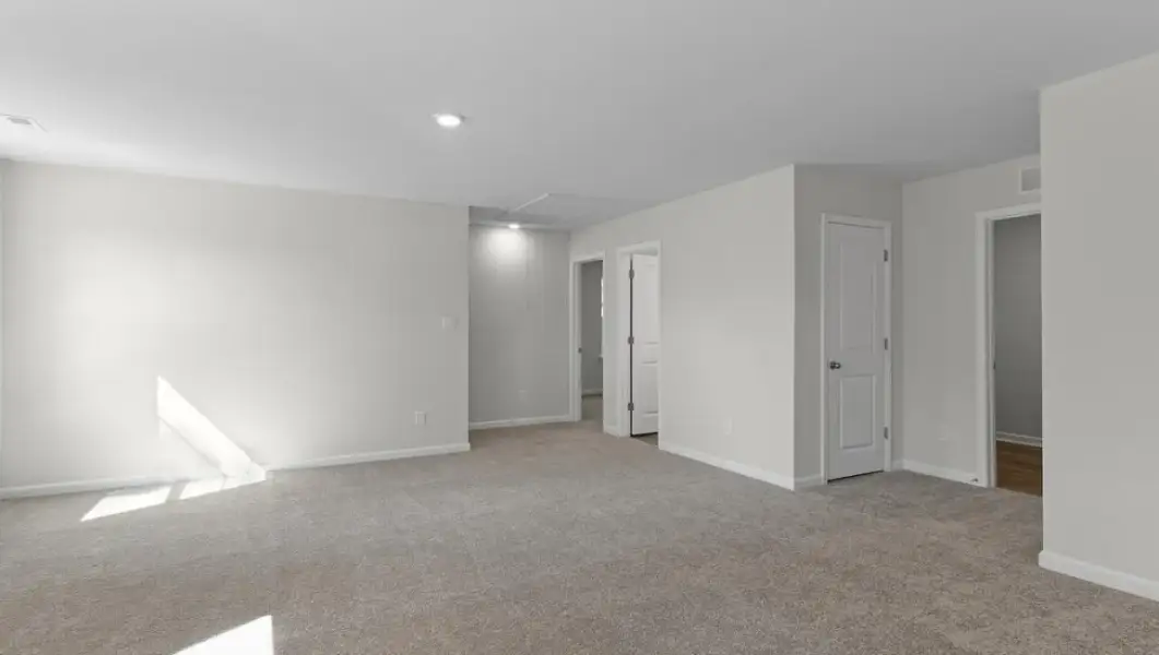 Spacious, unfurnished interior of a new home in The Highlands at Cedar Hill Landing, Navassa (Image 23).