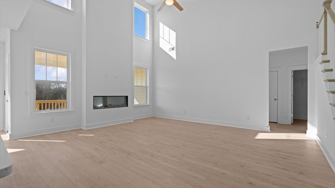 Exclusive living space with towering ceilings, tasteful finishes, and a warm, welcoming feel