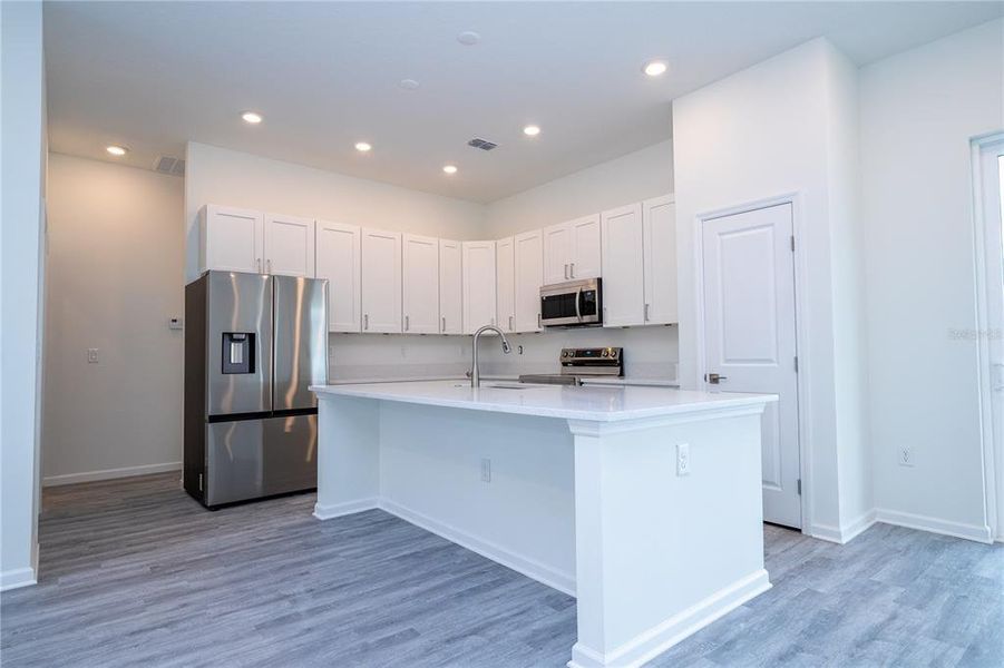 Furnished interior view inside a new home in , Kissimmee (Image 35).