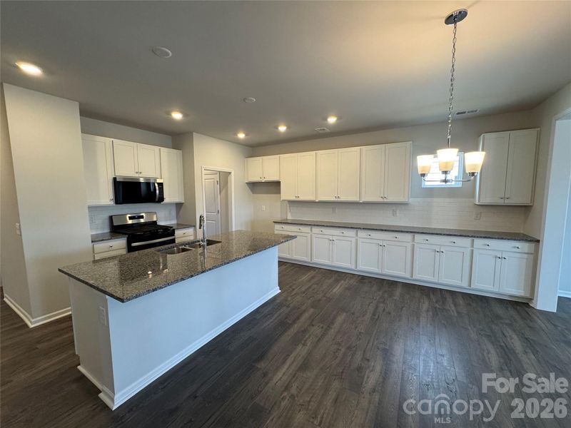 Furnished interior view inside a new home in McFarland Estates, York (Image 6).