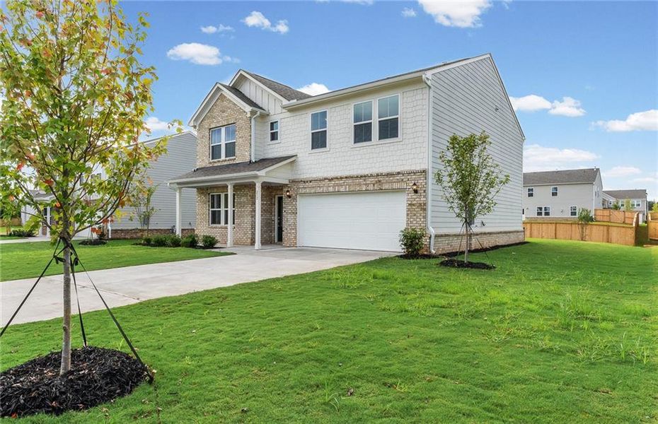 Front exterior of a new home in Anderson Point, McDonough, GA, highlighting curb appeal (Image 2).
