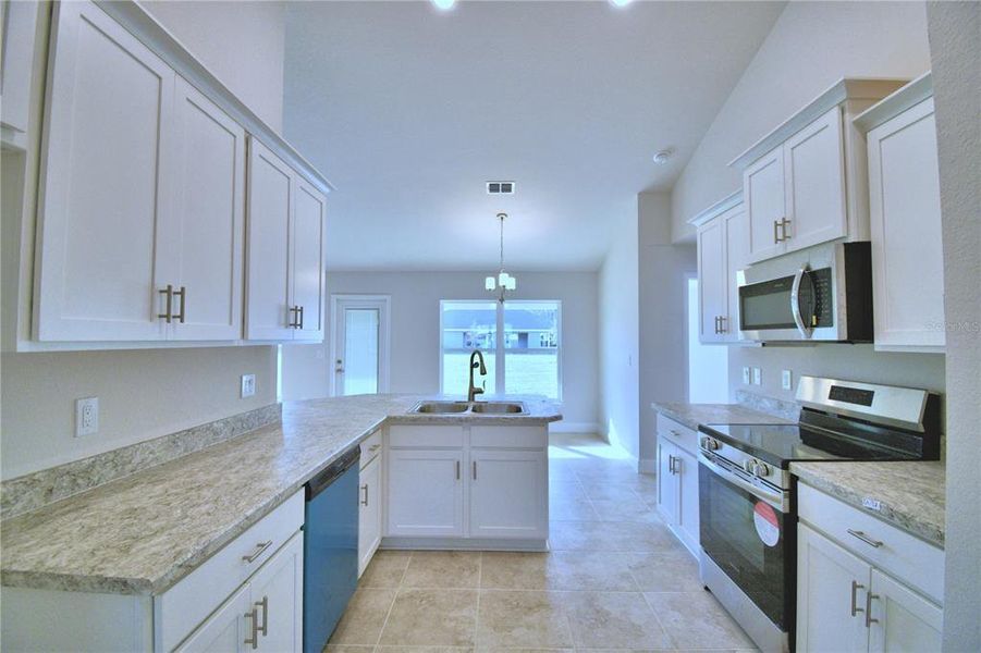 Furnished interior view inside a new home in Cadence Crossing, Auburndale (Image 12).