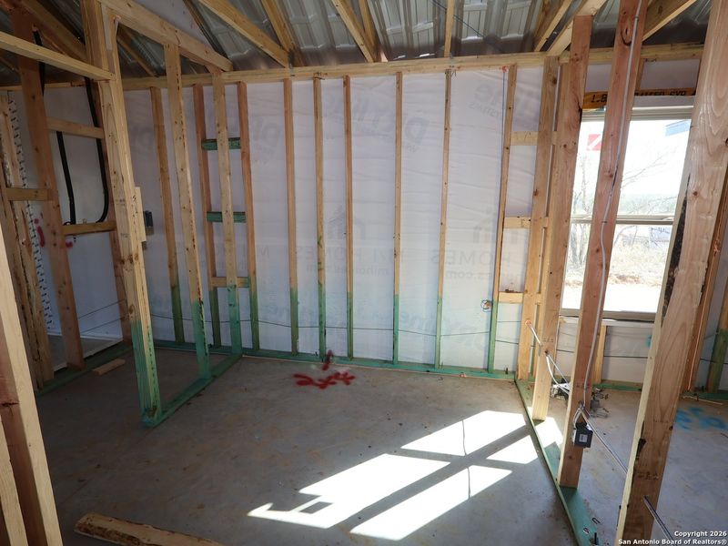 In-progress construction of a new home in Chaparral Ranch, Floresville, TX (Image 32).