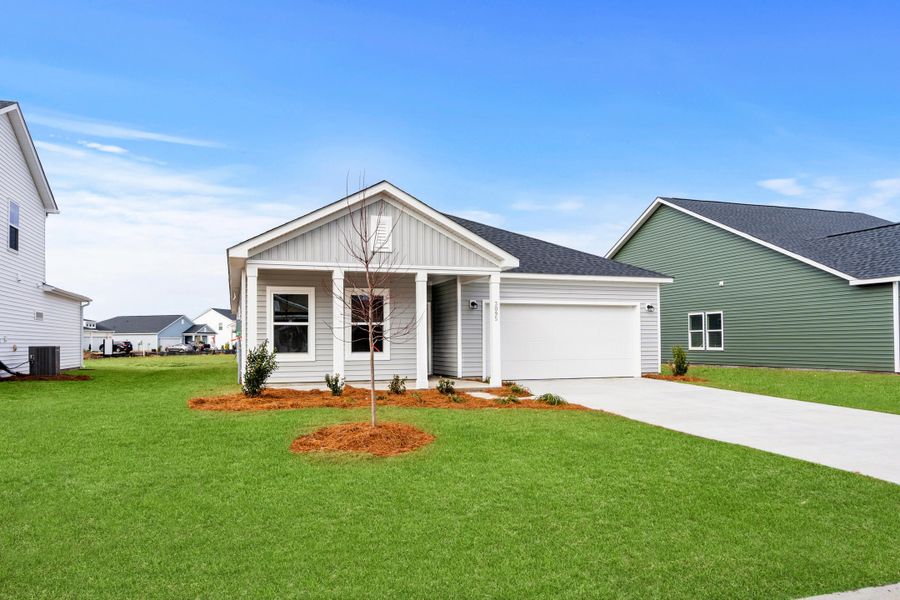Front exterior of a new home in , Summerville, SC, highlighting curb appeal (Image 2). Front exterior of a new home in , Summerville, SC, highlighting curb appeal (Image 2).