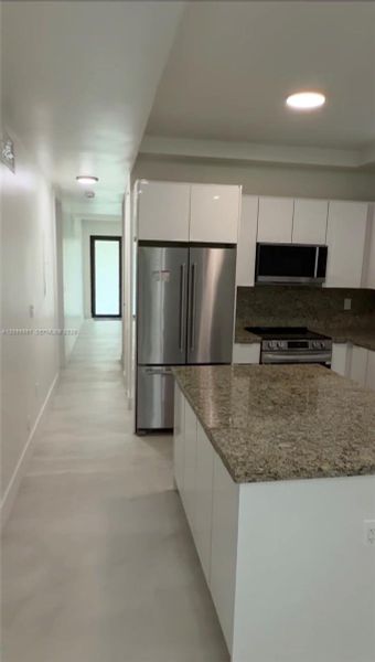Furnished interior view inside a new home in , Miami (Image 5).