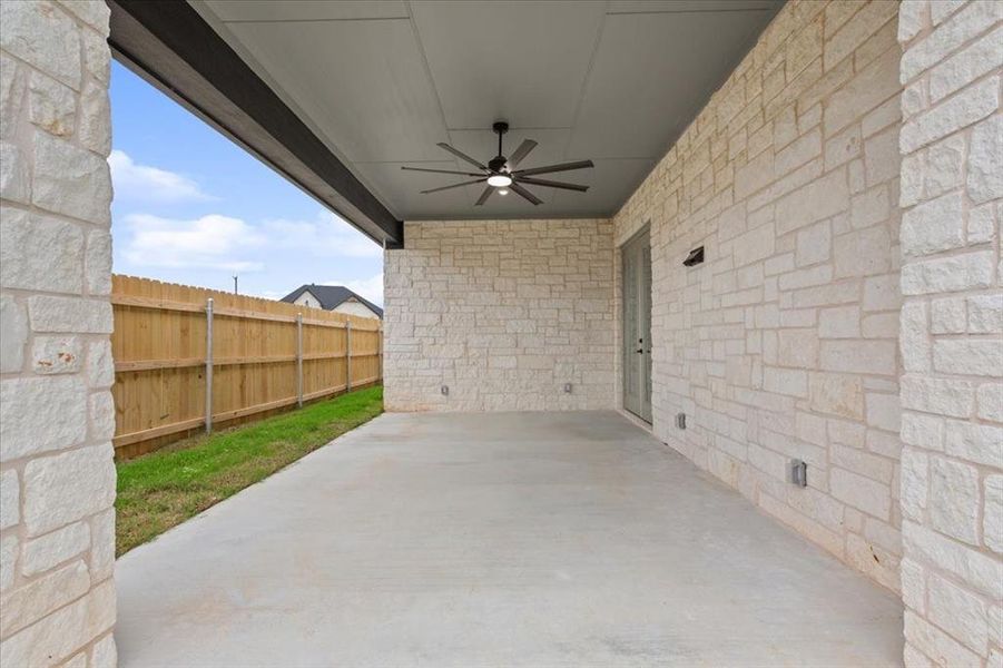 Exterior details and patio area of a home in , Hewitt (Image 30).