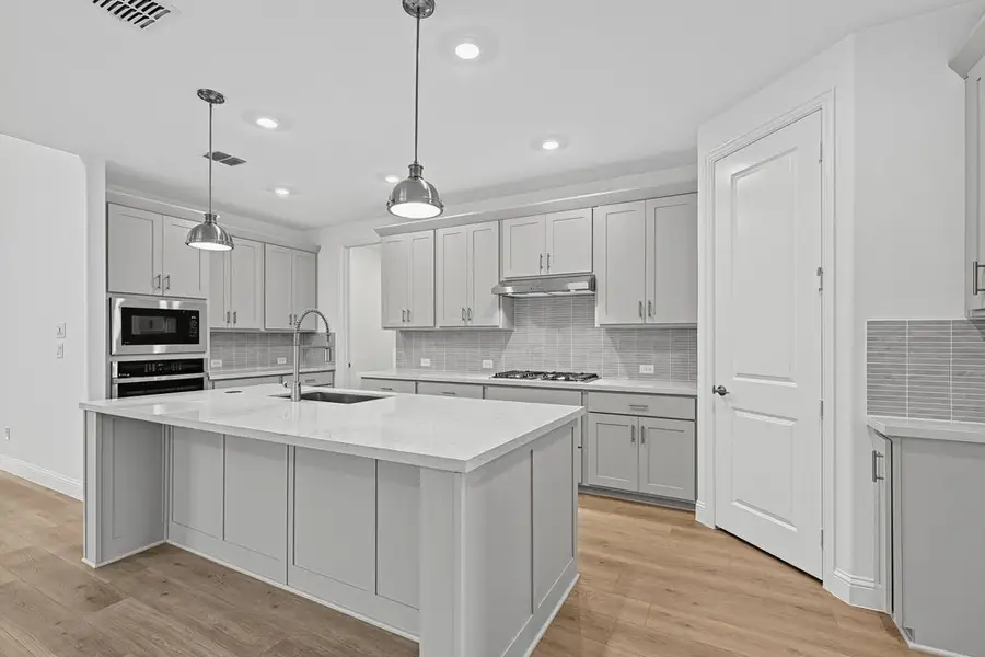 Furnished interior view inside a new home in South Oak, Lakewood Village (Image 9).