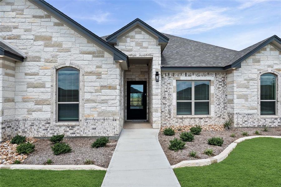 Front exterior of a new home in , Troy, TX, highlighting curb appeal (Image 26).
