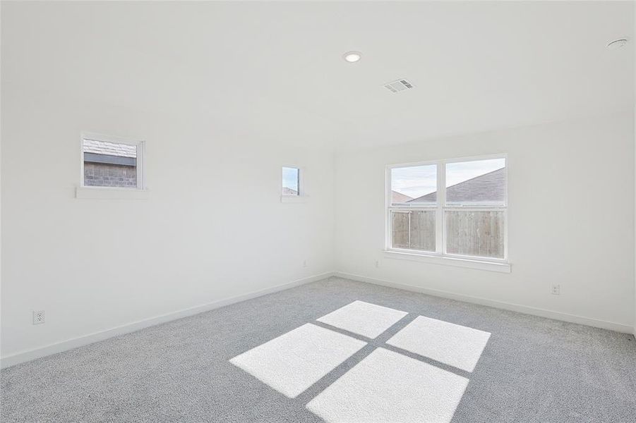 Empty room with carpet floors