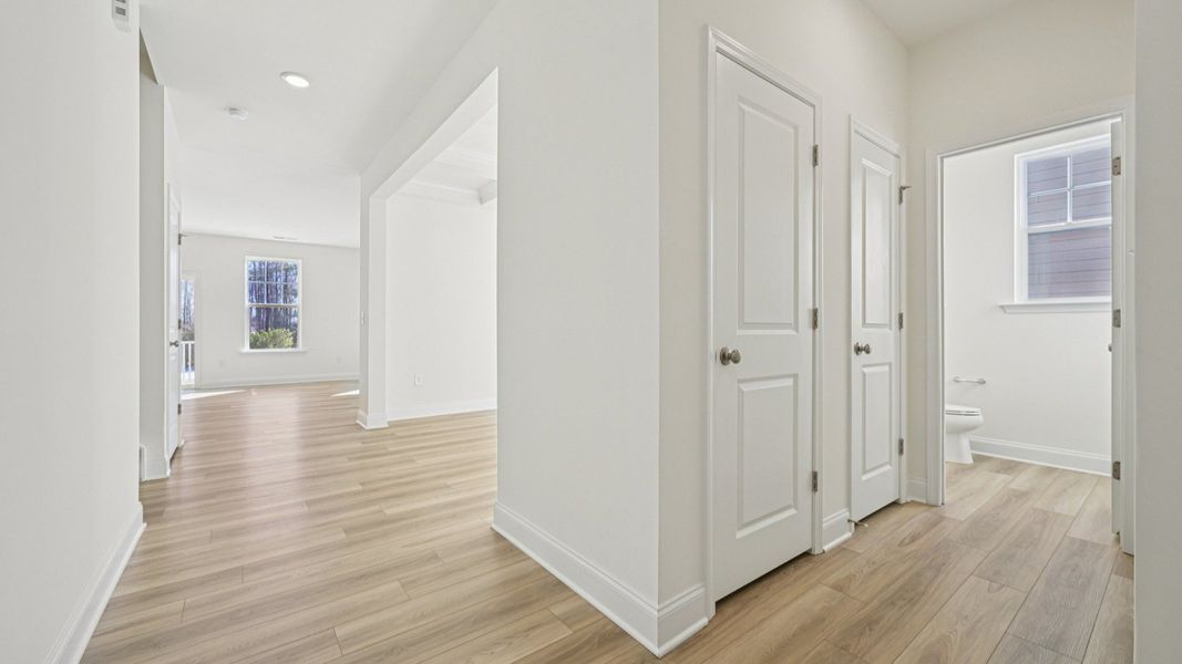 Wagener home plan front entry and powder bath leading into dining room Wagener home plan front entry and powder bath leading into dining room