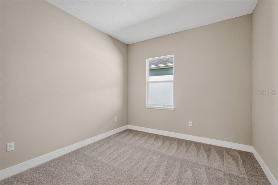 Spacious, unfurnished interior of a new home in Gray Hawk at Hole Two, Daytona Beach (Image 23).