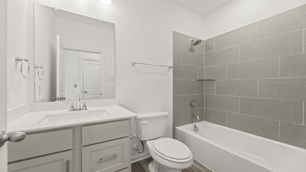 Furnished interior view inside a new home in Churchill 50s, Anna (Image 9). Furnished interior view inside a new home in Churchill 50s, Anna (Image 9).