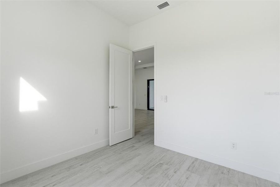 Spacious, unfurnished interior of a new home in , Port Charlotte (Image 30).