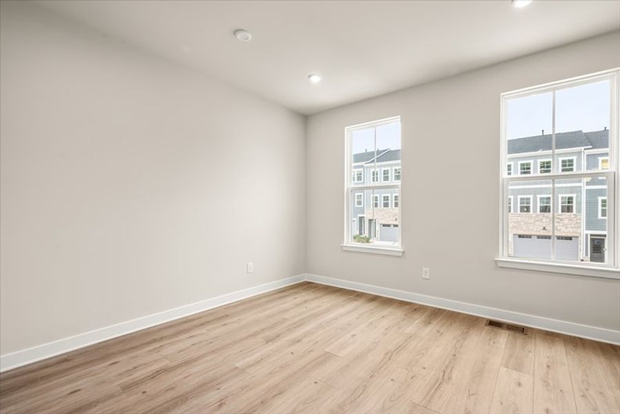 Spacious, unfurnished interior of a new home in Townes at The Station, Apex (Image 13).