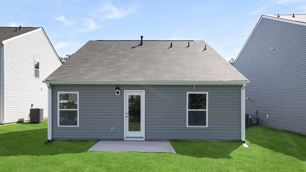 Exterior details and patio area of a home in Durbin Meadows, Fountain Inn (Image 19).