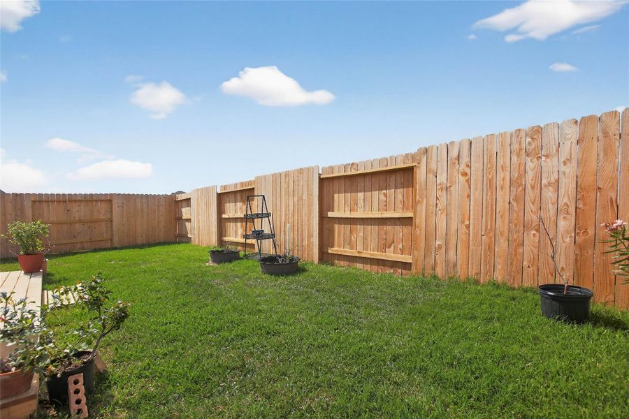 Exterior details and patio area of a home in Anniston, Katy (Image 30).
