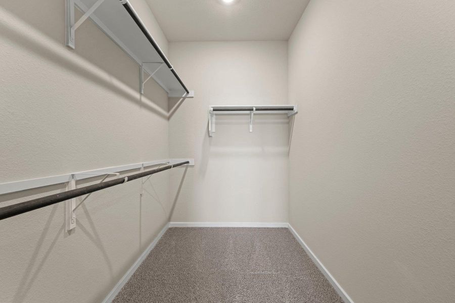Walk-in closet in Primary Bedroom