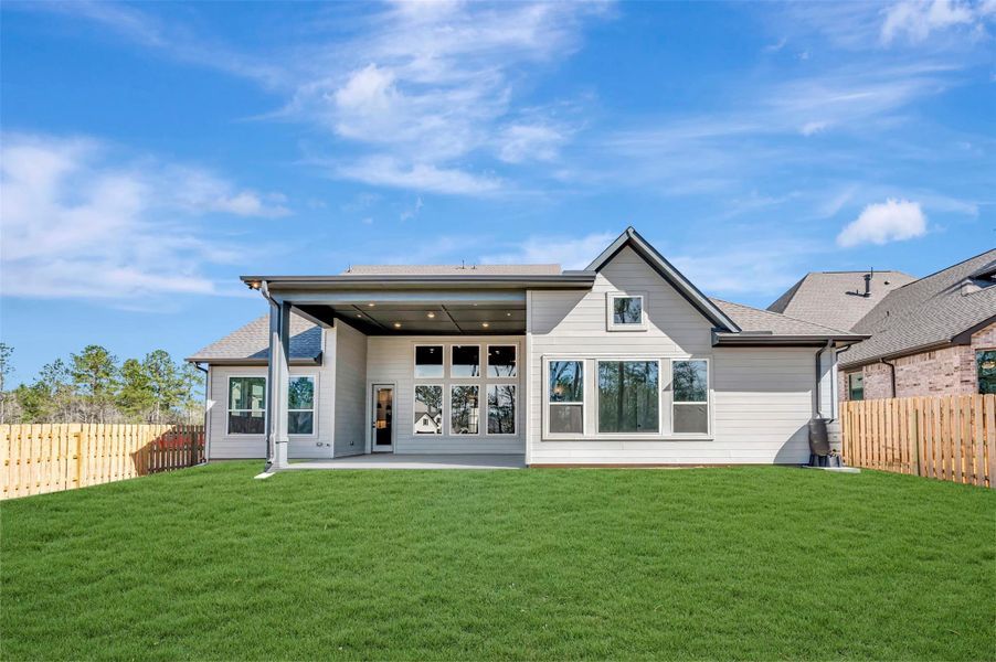 Huge covered Outdoor Living space with full gutters & sprinkler sys. Plenty of room for a pool!