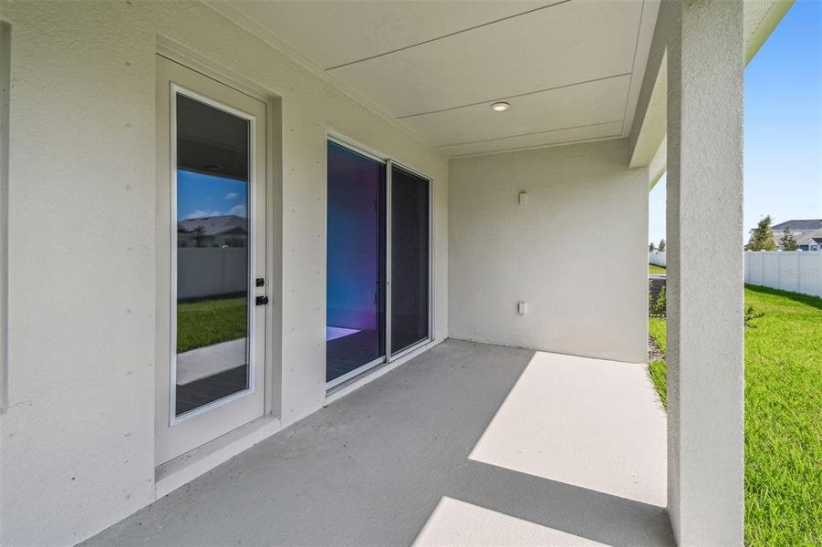 Exterior details and patio area of a home in The Peninsula at Rhodine Lake, Riverview (Image 28). Exterior details and patio area of a home in The Peninsula at Rhodine Lake, Riverview (Image 28).