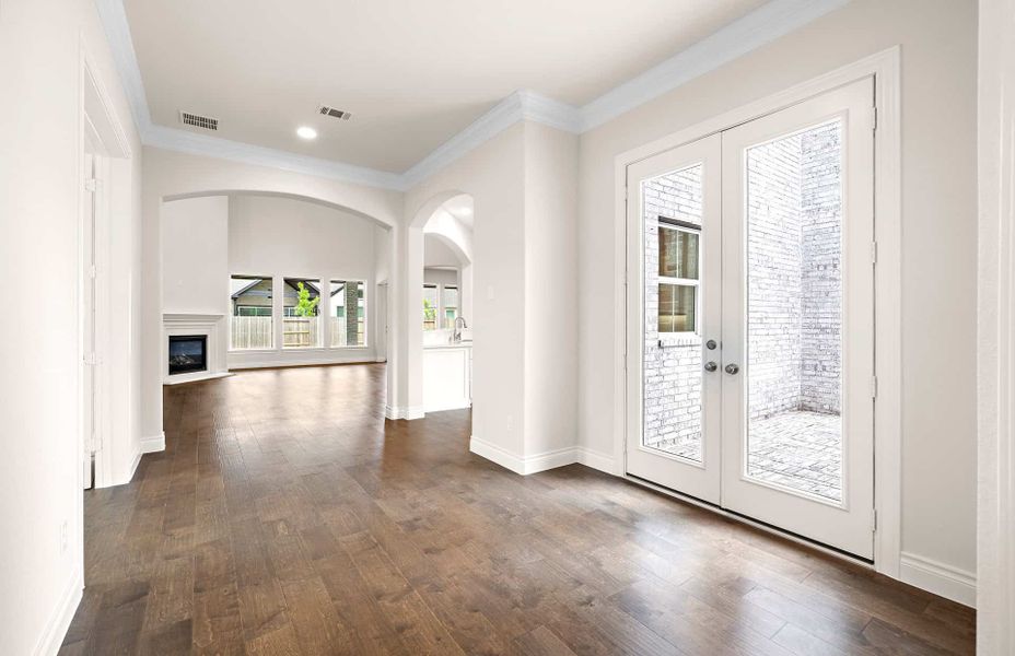 Representative unfurnished interior of a home built from the 4094 by Ravenna Homes in Artavia 70′, Conroe (Image 21).