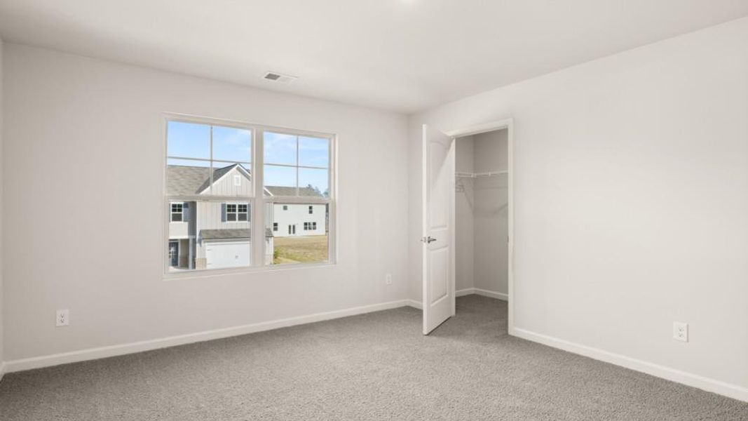 Spacious, unfurnished interior of a new home in Fairway 17 at Mirror Lake, Villa Rica (Image 19).