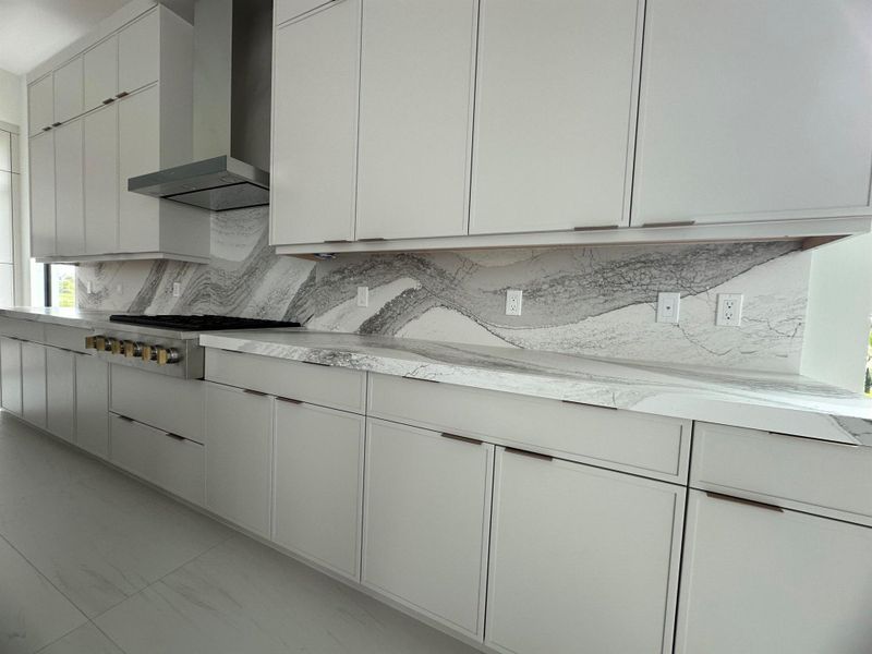 Furnished interior view inside a new home in Coral Isles at Avenir, Palm Beach Gardens (Image 28).