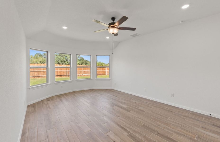Representative unfurnished interior of a home built from the McKinney by Pulte Homes in Crescent Bluff, Georgetown (Image 13).