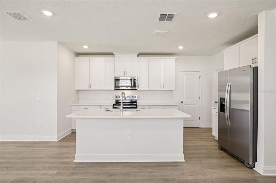 Furnished interior view inside a new home in The Reserve at Hammock Oaks - Classic Series, Lady Lake (Image 6).