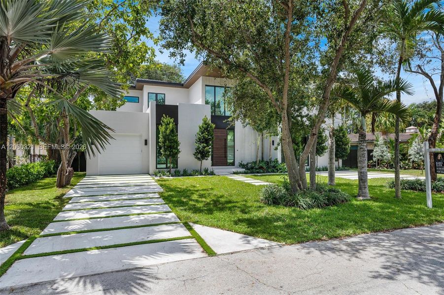 Front exterior of a new home in , Miami Shores, FL, highlighting curb appeal (Image 28). Front exterior of a new home in , Miami Shores, FL, highlighting curb appeal (Image 28).