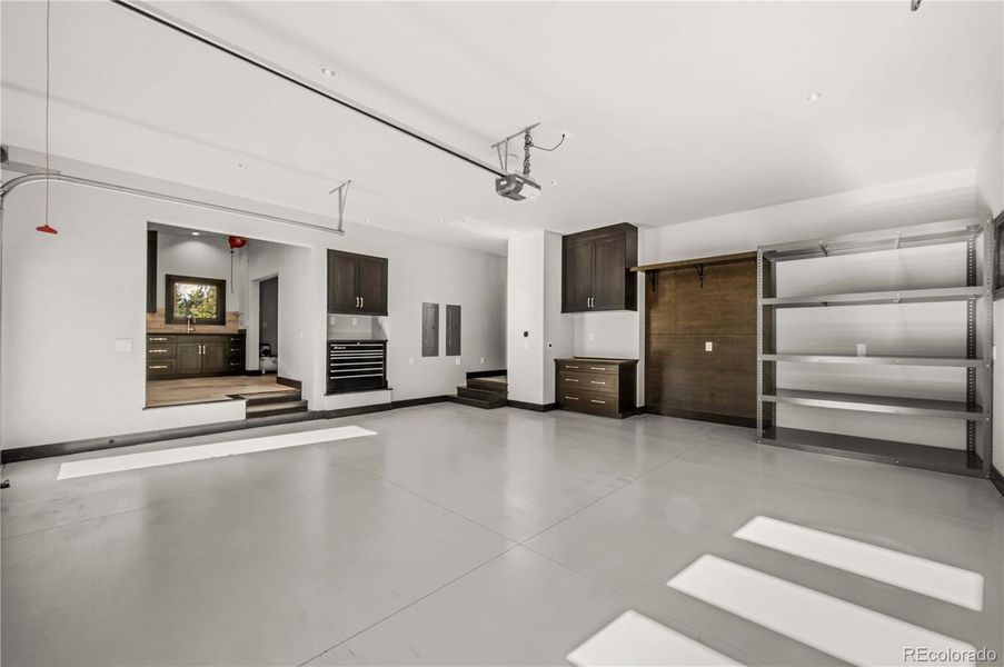 Attached 2-car heated and insulated garage/mudroom/laundry room Attached 2-car heated and insulated garage/mudroom/laundry room