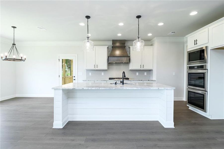 Furnished interior view inside a new home in Calgary Downs, Winder (Image 6).
