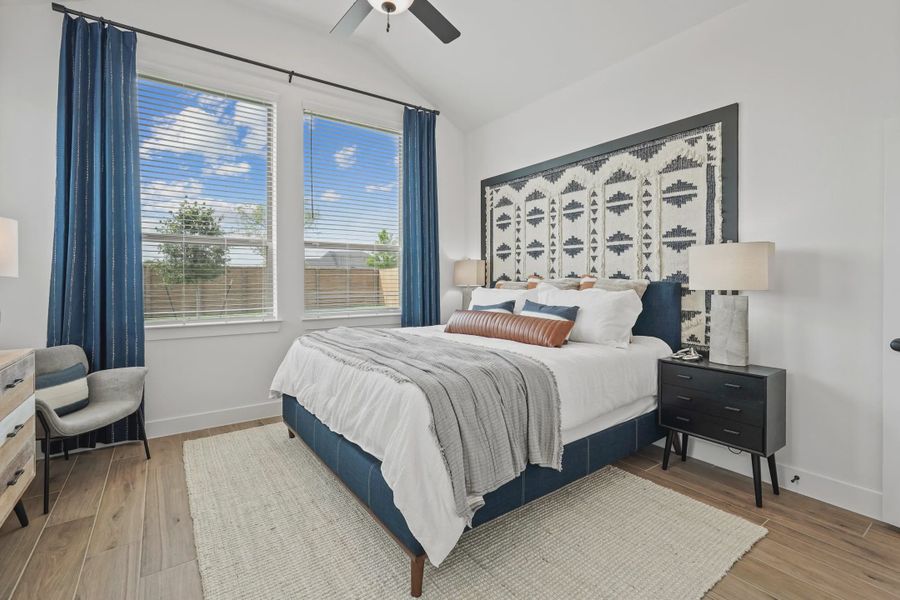 Furnished interior view inside a new home in Meridiana Chateau, Manvel (Image 11).