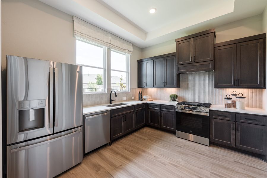 Representative furnished interior of a home built from the Camden by Tri Pointe Homes in Bridgeland, Cypress (Image 20).