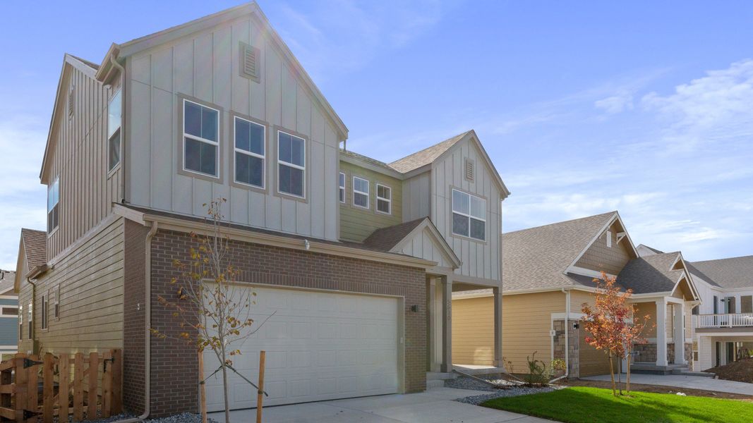 Front exterior of a new home in Dillon Pointe - Journey, Broomfield, CO, highlighting curb appeal (Image 23).