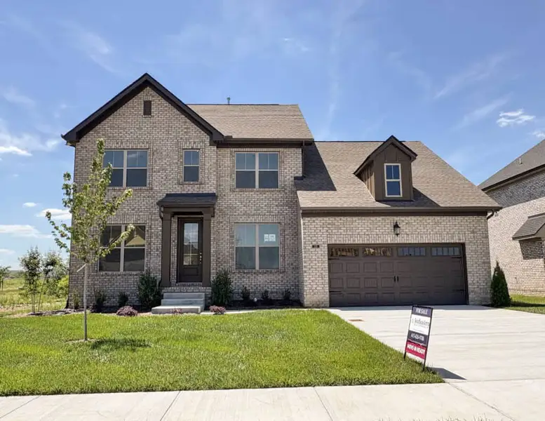Front exterior of a new home in Westfield Carriage Homes, Gallatin, TN, highlighting curb appeal (Image 1). Front exterior of a new home in Westfield Carriage Homes, Gallatin, TN, highlighting curb appeal (Image 1).