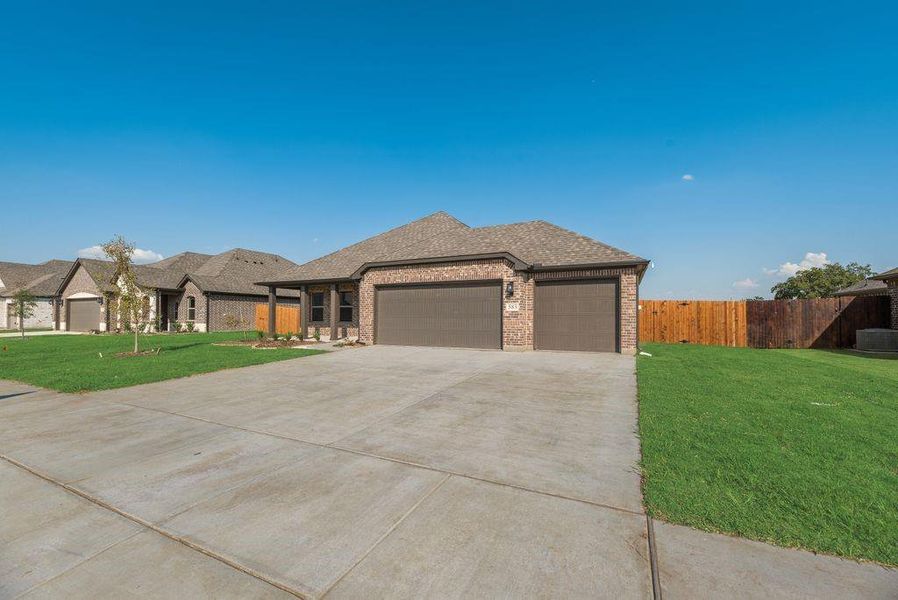 Front exterior of a new home in , Pilot Point, TX, highlighting curb appeal (Image 15). Front exterior of a new home in , Pilot Point, TX, highlighting curb appeal (Image 15).