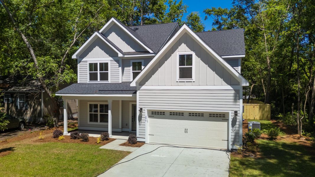 Front exterior of a new home in , Mount Pleasant, SC, highlighting curb appeal (Image 1). Front exterior of a new home in , Mount Pleasant, SC, highlighting curb appeal (Image 1).